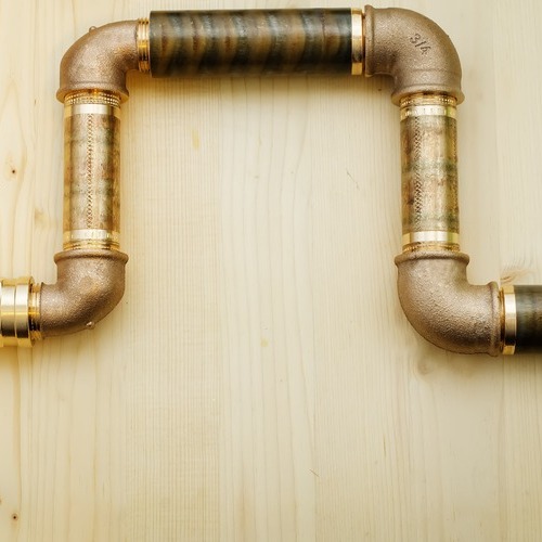 pipes against a wooden backdrop